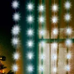 Home KAF 48L LED-es csillag fényfüggöny, 1,5x1 m / 48 db hidegfehér LED csillag figurákban, átlátszó vezeték, hálózati adapter, beltéri kivitel, KAF_48L