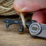 True Utility Minimalist, TU208K, multifunkcionális szerszám, designer kés, fekete titánbevonat, rozsdamentes acél penge, TU208K